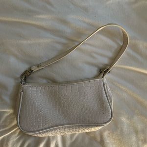 White snakeskin purse